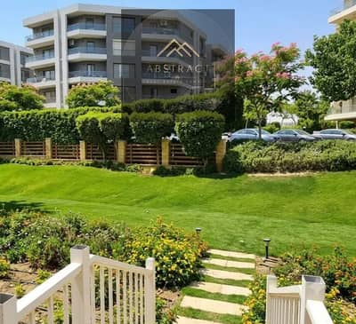 With a 54% discount, a ground floor apartment with a garden in the best phase of Taj City, installment plan over 10 years, in front of the airport