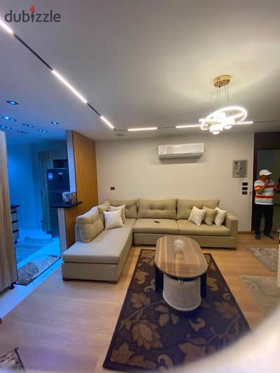 Furnished apartment for rent in the Katameya Gate compound (Memaar Al Morshedy); super-lux finish, first-time occupancy.