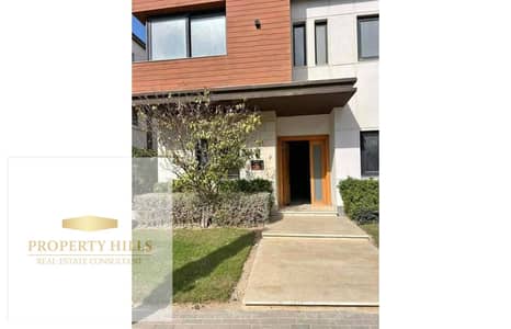 Corner townhouse villa for sale with a down payment of only 5% and the cheapest price in the market, with installments over 10 years inside Azar in New Cairo, with a dangerous view of the landscape compound villas.