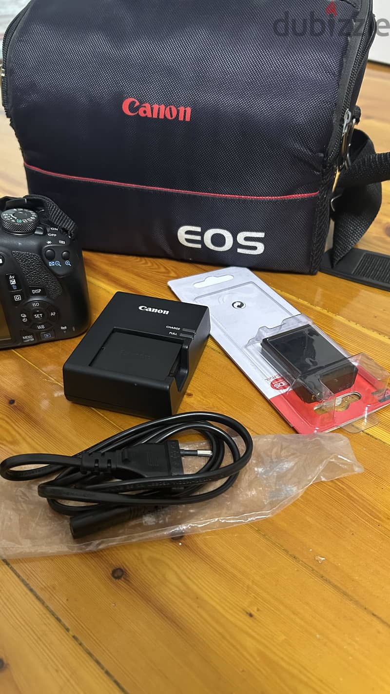Canon EOS 2000D + 18-55mm Lens + Bag & Charger 1