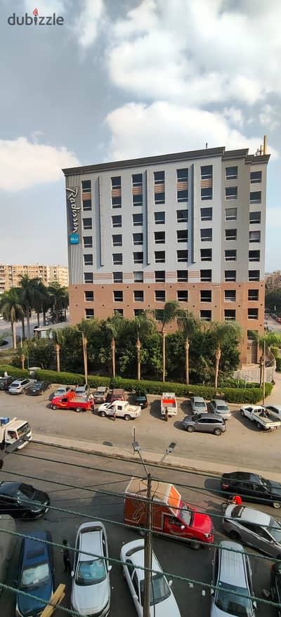 Apartment for sale 120m in Sheraton Airport Residences, Nasr Street, in front of Radisson Blu Hotel, fourth floor, 3 rooms, 2 bathrooms, 2 elevators, first owner