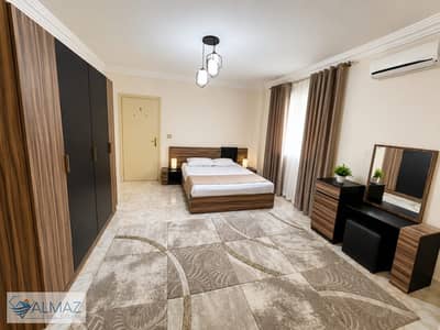 Furnished 200m² apartment with a garden in Al Rehab, Phase 4, Group 93—close to major thoroughfares. Ground floor with a garden.