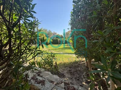 Standalone villa for sale with a landscape view in Al Karma 2