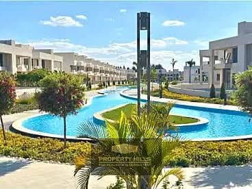 Receive a townhouse immediately with a lagoon view next to La Vista and in front of Beverly Hills
