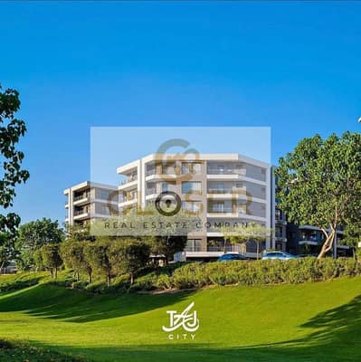 apartment with a garden for sale, priced at 950,000, located next to the Kempinski Hotel in a fully serviced compound.