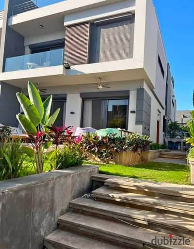 Middle townhouse for sale, just minutes from the American University, in a prime location in New Cairo's Fifth Settlement