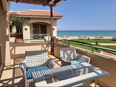 First-row chalet for sale in Telal El Sokhna | Panoramic views of the sea and lagoon | Fully finished with Super Lux finishing