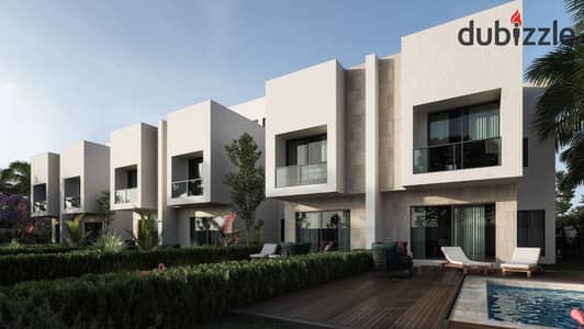 I live in a townhouse villa for sale at the price of an apartment in Sheikh Zayed, in front of Beverly Hills.
