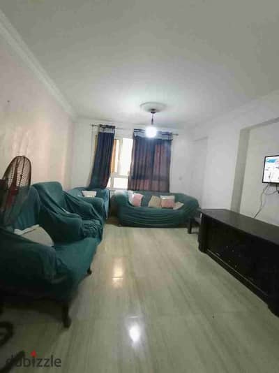Furnished apartment for rent on the Corniche in Maadi, second row, you can see the Nile from the side, near the International Peace Hospital