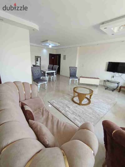 Furnished apartment for rent in Maadi near the subway station and 9th Street consisting of three bedrooms and a reception, 2 bathrooms, and a fully air-conditioned kitchen with Wi-Fi, natural gas, 11th floor, elevator, excellent location