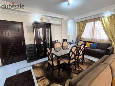 Al-Maadi Dijlah furnished apartment for rent consisting of two bedrooms, a reception, a bathroom, and a fully air-conditioned kitchen with Wi-Fi, natural gas, second floor, elevator, distinguished and upscale location