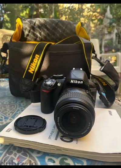 كاميرا نيكون Nikon D3100 بحالة ممتازة + العدسة والأغراض كاملة