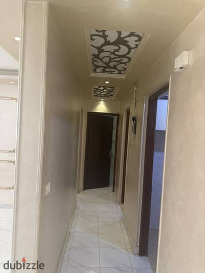 Apartment 89m with kitchen, chandelier, and curtains for rent in Madinaty