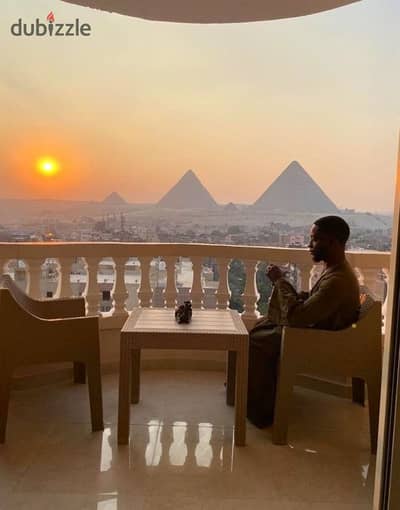 Buy in EGP and Invest in USD | Studio for Sale with a Pyramids View in a Compound with Views of the Grand Egyptian Museum & Pyramids | Daily Investmen