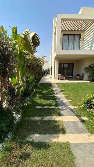 4-bedroom villa on the lagoon with complete privacy and a private pool for sale in New Cairo near Sodic the Middle Ring Road Stone Park and Palm Hills