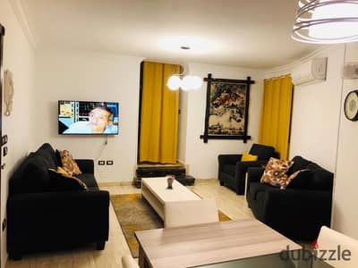 Furnished apartment for rent in Wireless Division, New Maadi, hotel-like, near Andalusia Hospital and Nasr Street, consisting of two bedrooms, reception, bathroom, and fully air-conditioned kitchen, Wi-Fi, natural gas