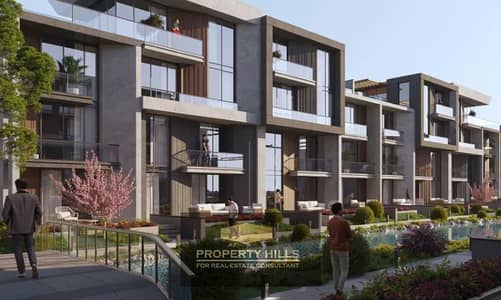 Own a townhouse with smart space within a direct connection to Dahshur Road and near Palm Hills