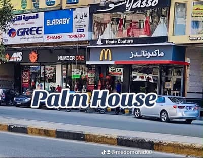 For sale, a 73 square meter shop with a front on Faisal Street, rented for 121 thousand monthly for a brand.