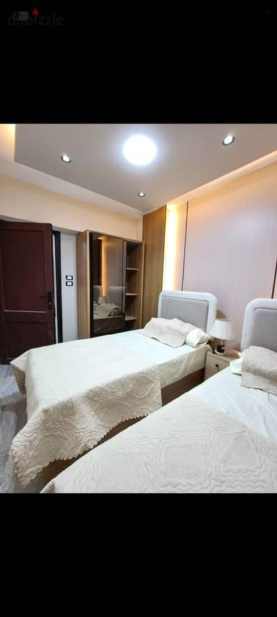 Apartment with a room, hall, kitchen, and bathroom in the first neighborhood, first district in October City for rent