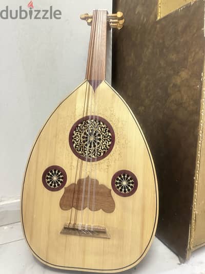Oud with its padded bag and strings