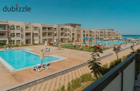 Fully finished 2-bedroom chalet for sale, featuring natural gas and direct lagoon access, situated in a prime location at Aroma Resort, Ain Sokhna.