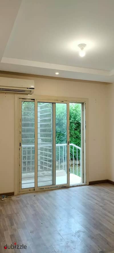 Apartment for rent with kitchen and air conditioning on the ground floor with a garden in the Address Compound, Sheikh Zayed
