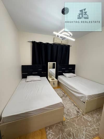 For rent, a furnished apartment in Rawdat Zayed compound with modern furniture, fully air-conditioned and furnished, and has internet, first floor next to services.