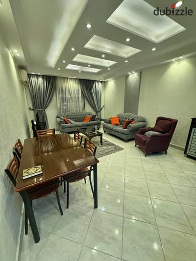 Furnished apartment for rent 90 sqm second floor elevator directly adjacent to services Old Market and food court super lux finishing Phase 1 Al Rehab