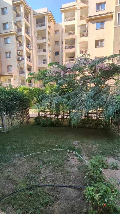 For sale in Madinty, B2, a ground apartment of 88 meters with a garden of 45 meters, special finishing in the kitchen, view garden