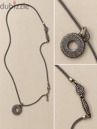 Faith necklace by Azza Fahmy