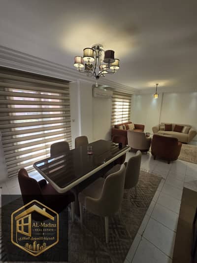 Furnished apartment, first occupancy, in Al Rehab, garden view and directly opposite services.