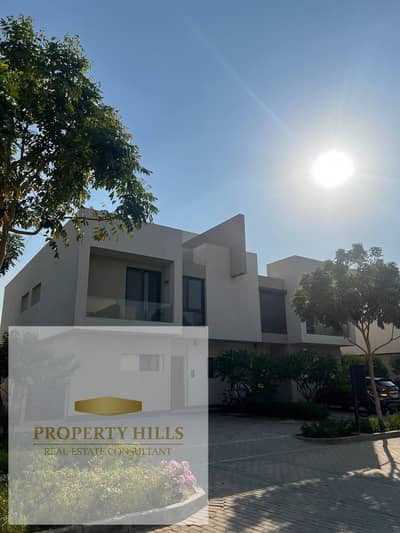 Live in Al Burouj and take possession of a twin house in a prime location, featuring a direct view of the land escape