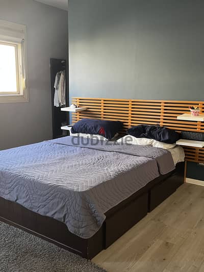 Used wooden bed with storage