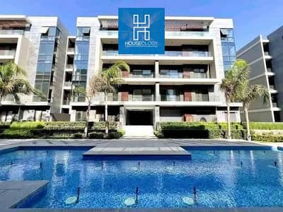 Apartment with a prime location overlooking the largest landscaped area for sale in Patio Riva compound, New Cairo