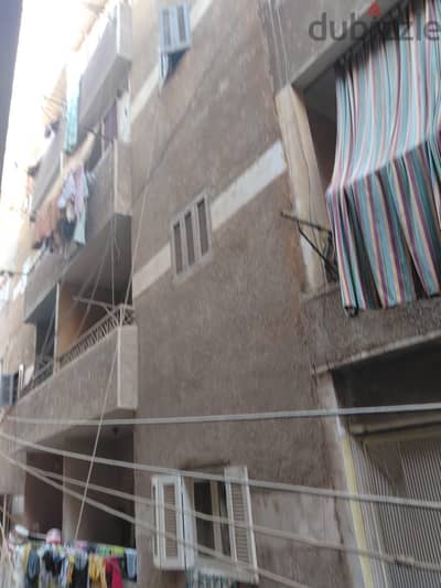 عمارة بالقرب من نهر النيل للبيع ٩شقق و٢ محل ٤ ادوار وروف