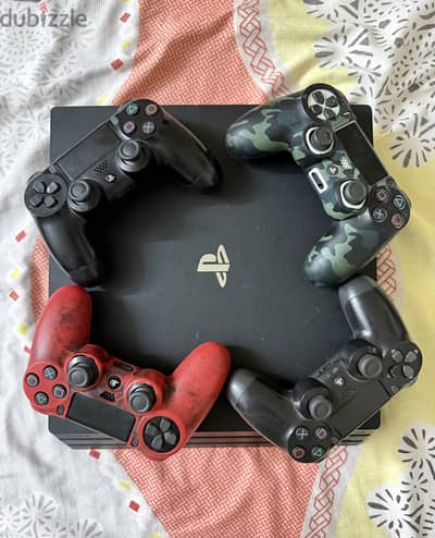 Playstation 4 pro 1tb &17 game& 4 controllers