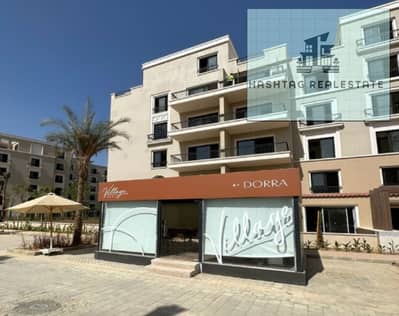 Apartment for sale in the Village West compound, Sheikh Zayed, ground floor with garden, super lux finishing with air conditioning, apartment area 177 sqm, garden area 60 sqm, first phase, immediate delivery