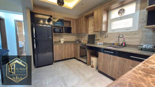 Furnished apartment, first occupancy, in Al Rehab, at a very special price, directly opposite services.