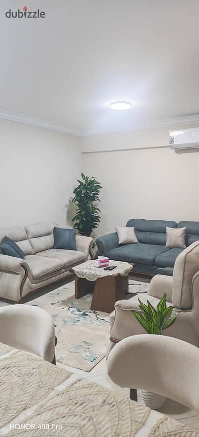 Apartment for rent in the Dar Misr compound, East of the Money and Business area, ground floor, secured with iron, area 115 meters, furnished with hotel-quality furnishings, fully air-conditioned