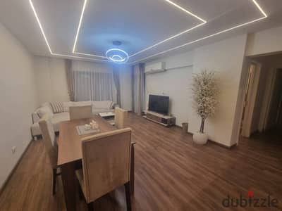 For rent, a furnished apartment of 90 square meters in Al Rehab