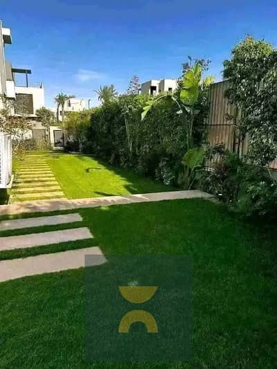 villa on the lagoon with complete privacy and a private pool for sale in New Cairo near Sodic the Middle Ring Road Stone Park and Palm Hills