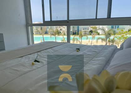 First row chalet on Crystal Lagoon  Enjoy a unique summer experience on beach next to Hacienda Hyde Park and Modon