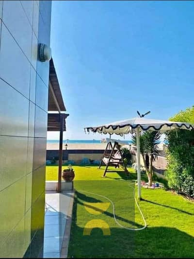 Corner villa with private pool, panoramic sea view, hotel finishing for sale in the North Coast minutes from South Med and Ghazala