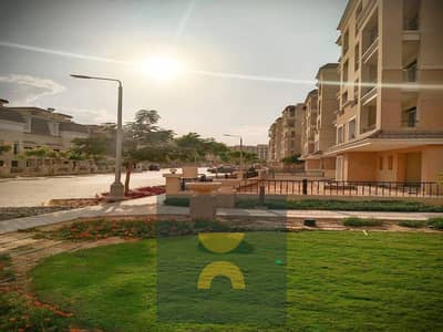 For sale with a low down payment opposite Madinaty a ground floor apartment with 3 rooms and a private garden in Sarai New Cairo
