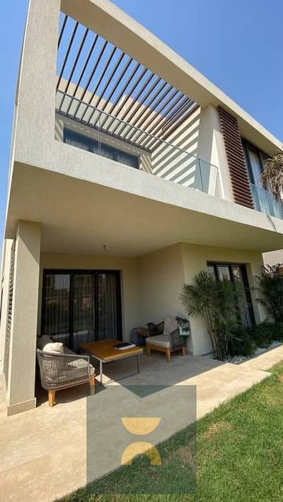 For sale at half price a 4-bedroom villa with a private pool in the best location in New Cairo on the Suez Road next to Madinaty and near Sodic Mivida