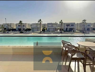 A guaranteed investment opportunity in Ras El Hekma a VIP chalet first row to the lagoon hotel-style finishing next to Con Seasons Cali Coast lavista