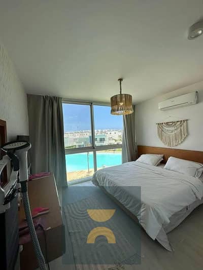 own a two-bedroom chalet first row on Crystal Lagoon next to Modon and Sea Shore Hyde Park Almaza Bay