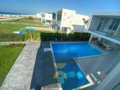 Just a minute from the sea and marina in Ras El Hekma a villa for sale in prime location minutes from Silver Sands Hacienda Swan Lake and Summer
