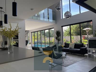 For sale at half price a 4-bedroom villa with a private pool in the best location in New Cairo on the Suez Road next to Madinaty and near Sodic Mivida