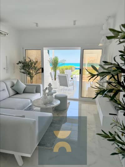 Chalet for sale with a 30% discount fully finished with ACs  sea and lagoon  view in Ras El Hekma near modon and minutes from John Sodic Caesar and Mo
